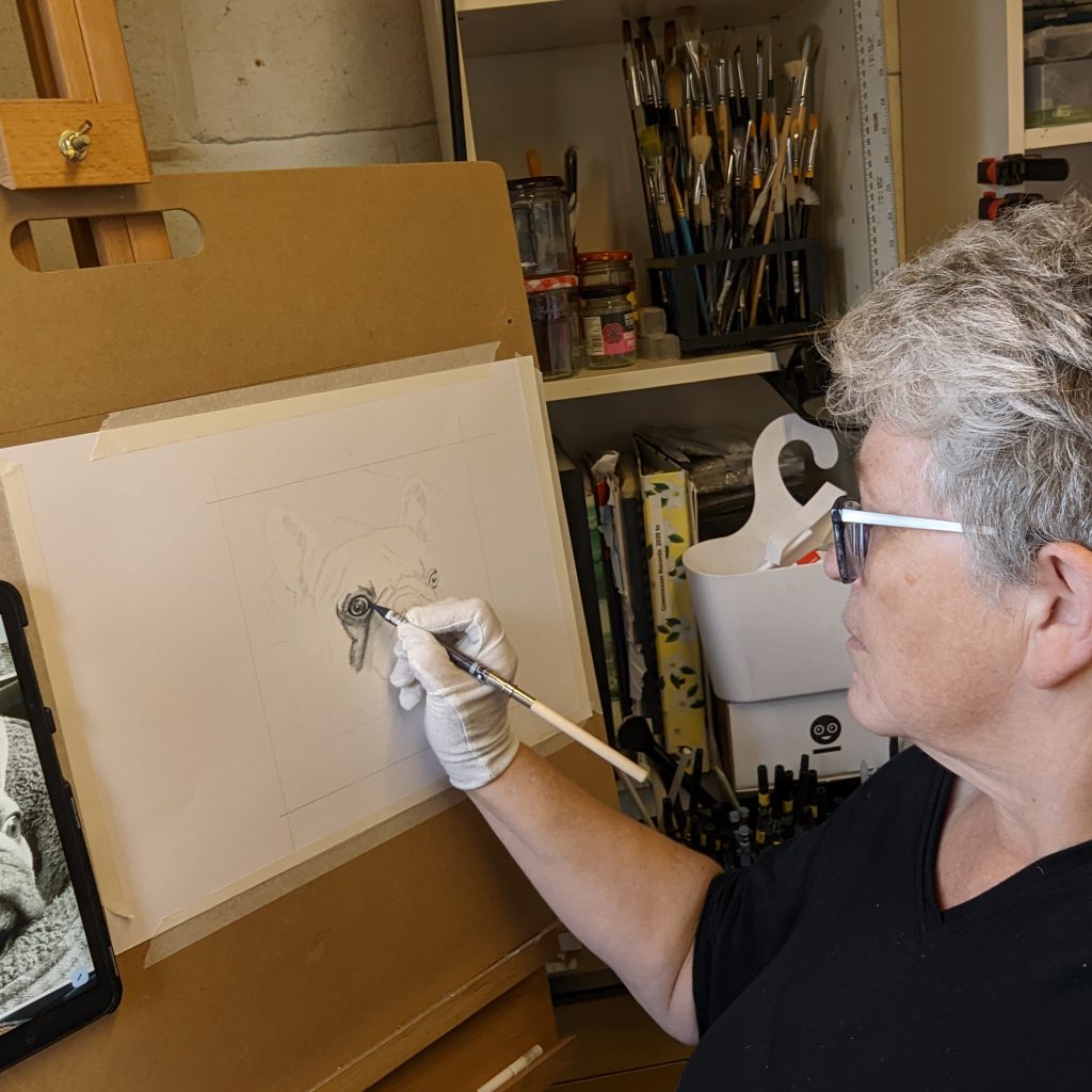 Catherine working on a pet portrait